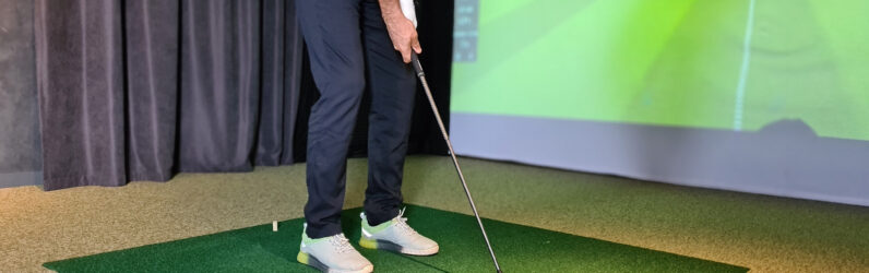 Golf player playing golf indoors on golf simulator, golf instruction Pekin IL, golf coaching Pekin IL, golf lessons near Pekin IL, golf swing lessons Pekin IL, private golf lessons Pekin IL, beginner golf lessons Pekin IL, golf training Pekin IL, golf instructor Pekin IL, indoor golf lessons Pekin IL, golf simulator lessons Pekin IL, golf coach near Pekin IL, putting lessons Pekin IL, golf improvement Pekin IL, custom club fitting Pekin IL, golf practice Pekin IL, junior golf lessons Pekin IL, adult golf lessons Pekin IL, golf academy Central Illinois, golf lesson studio Pekin IL, golf swing coach Pekin IL